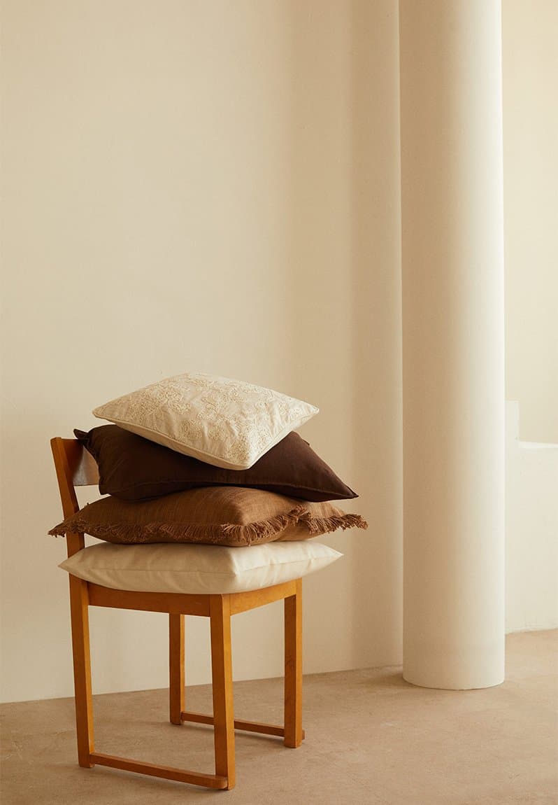 Embroidered cushion cover