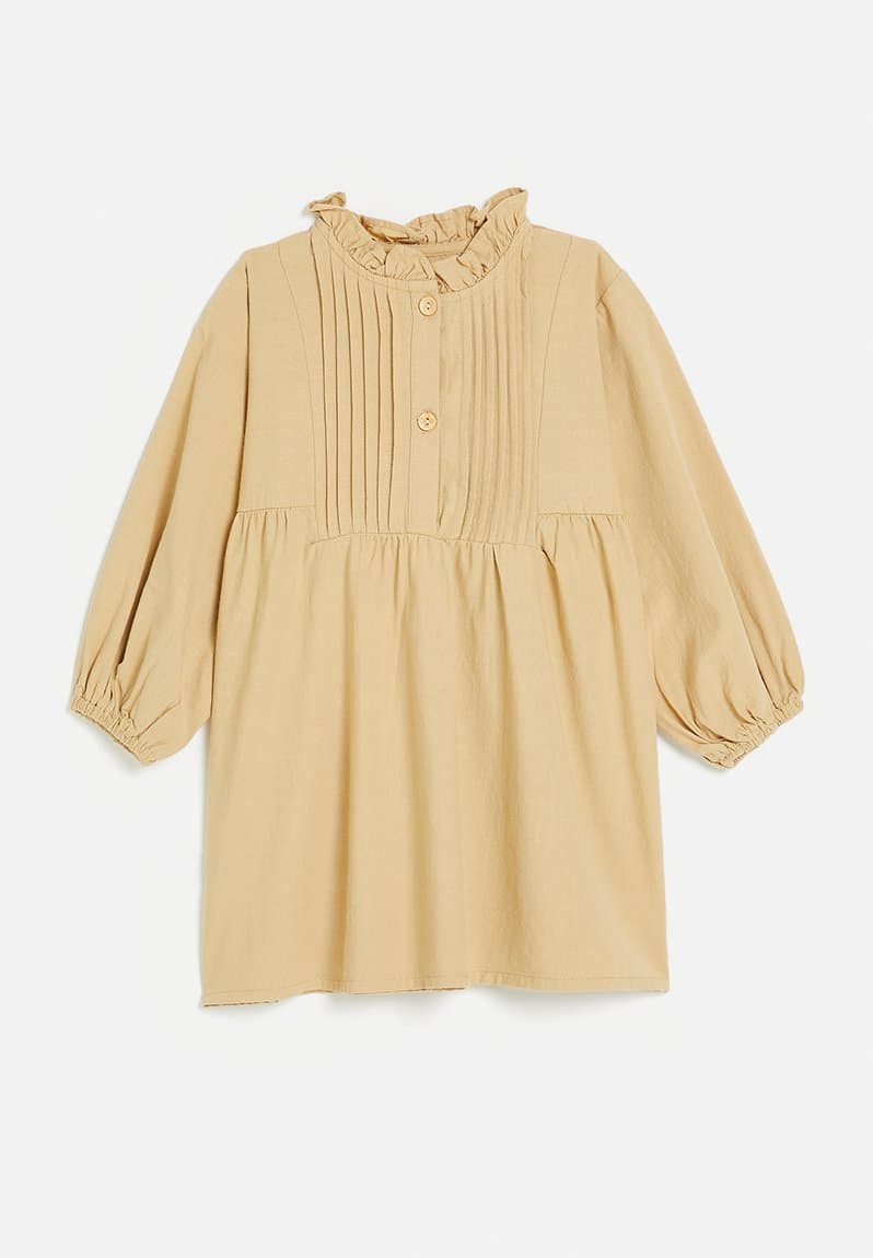Pin tucked bib dress with ruffle collar