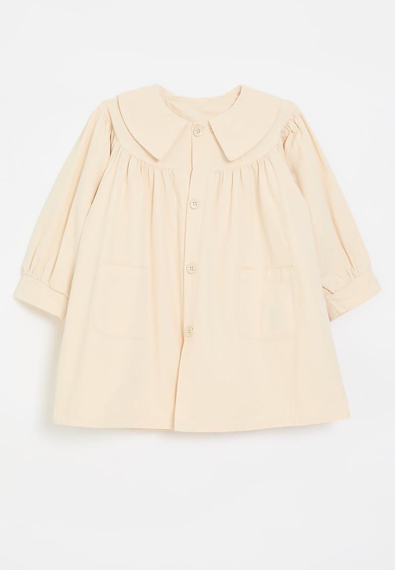 Vintage inspired dress with pointed flat collar parchment