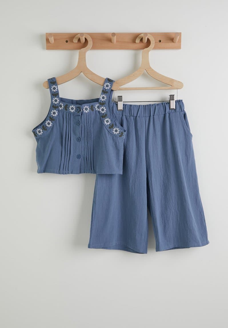 Embroidered top and wide leg jeans