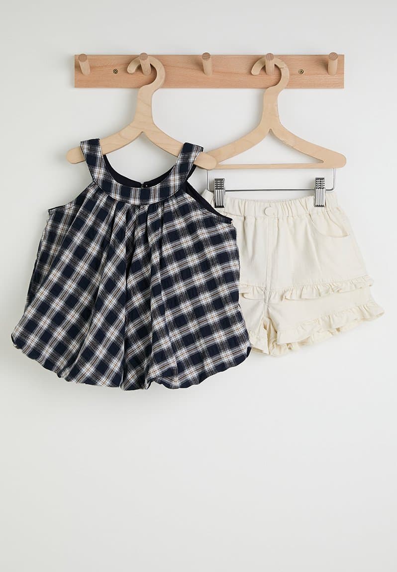 Check cutaway bubble top with ruffle shorts