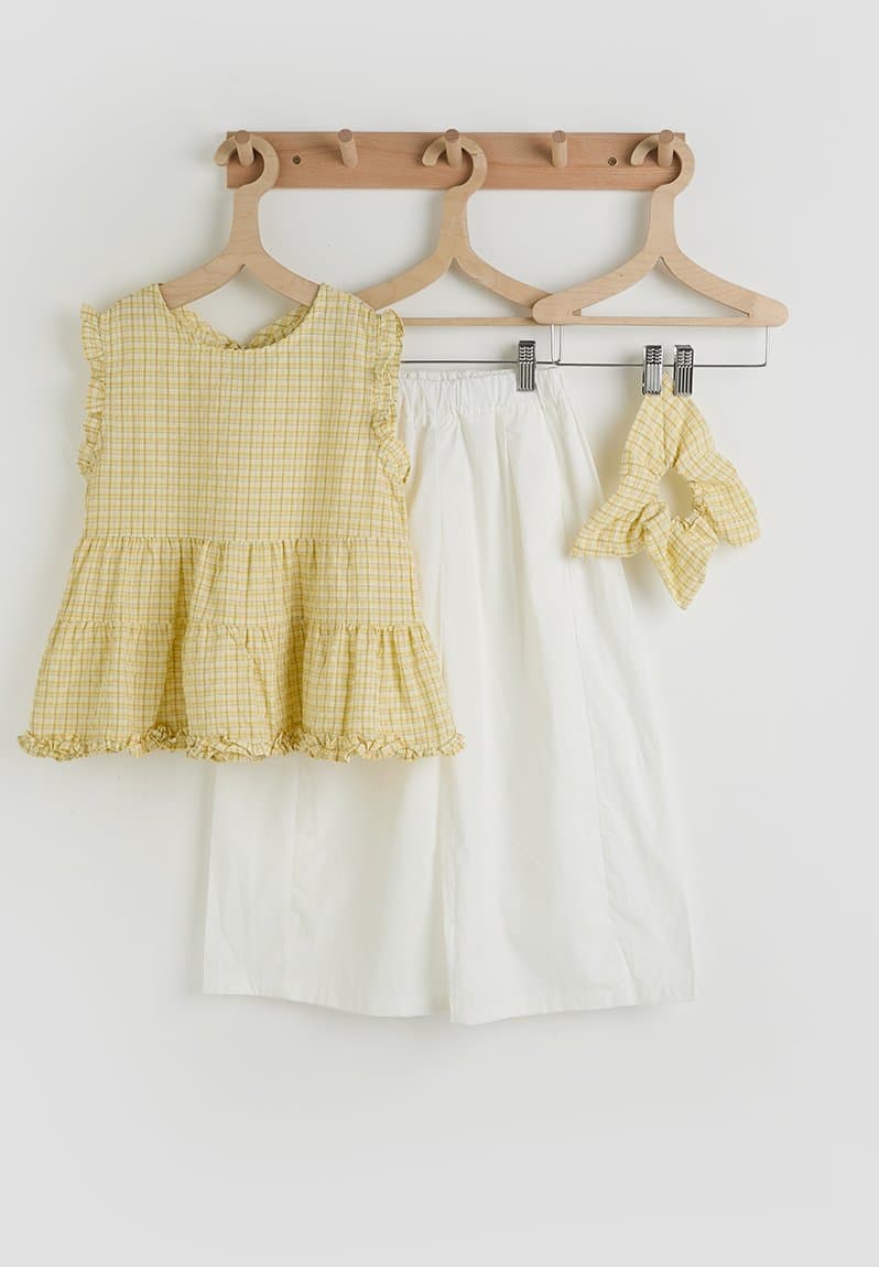 Ruffle hem peplum top & panelled pants